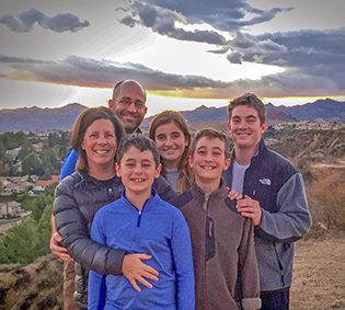 Karen Ostler (far left) with her family