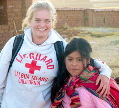 NLC alumna Tori Raine and a friend in Peru